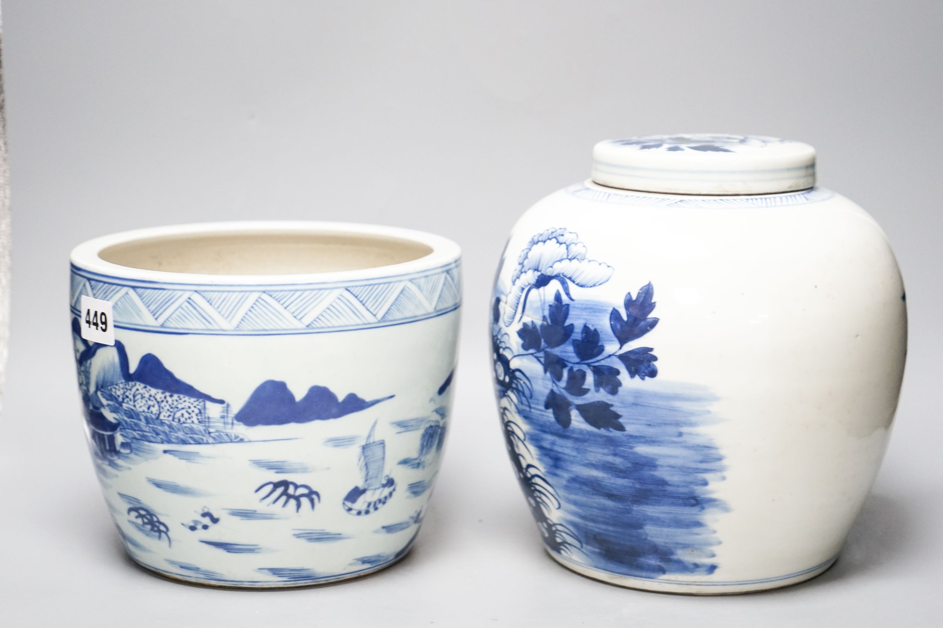 A Chinese blue and white jar and cover and a similar jardiniere, 23cm